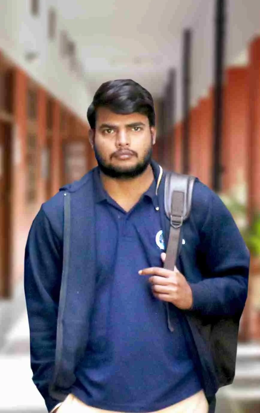 Student walking on campus after graduation